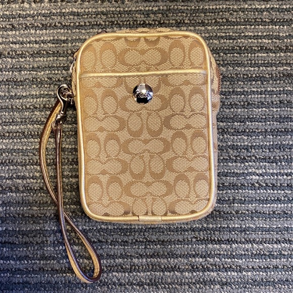 Coach Handbags - 𝅺NWOT Coach Beige Gold Trim Monogram Wristlet